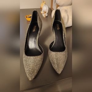 Michael Michael Kors Women's Dorothy Flex Pump, the material is rubber.